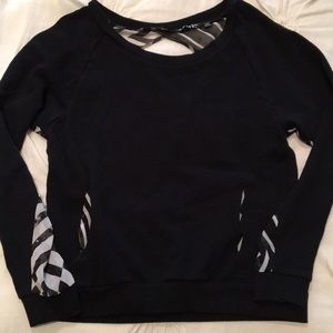 Volcom sweater with sheer sleeves and open back